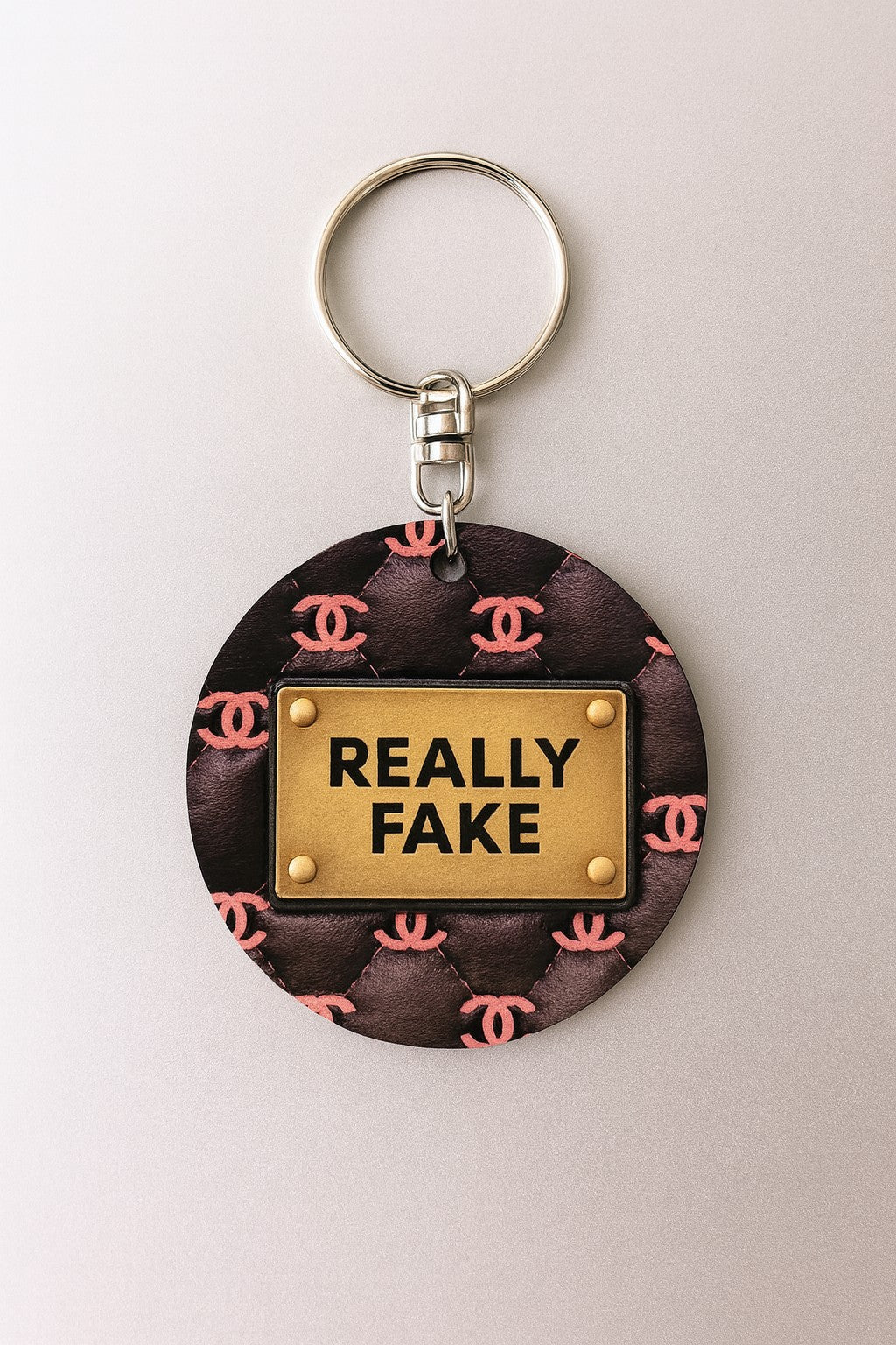 Portachiavi/Charm in legno "Really Fake"