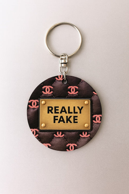 Portachiavi/Charm in legno "Really Fake"